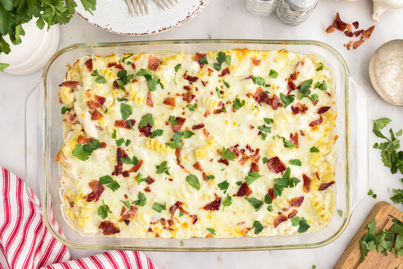 bacon chicken ranch casserole with chopped parsley overhead
