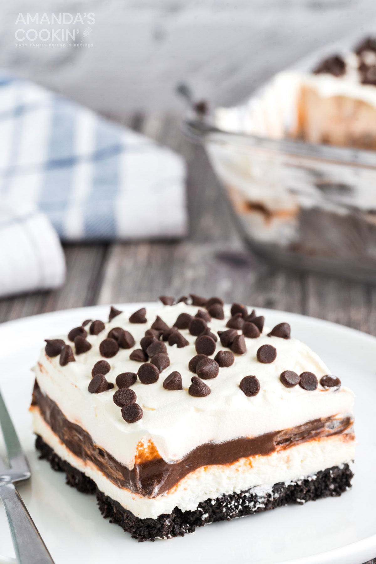 Chocolate lasagna is a no baked layered dessert made with cookies, cream cheese, whipped cream and chocolate pudding. It's a chocolate dessert dream!