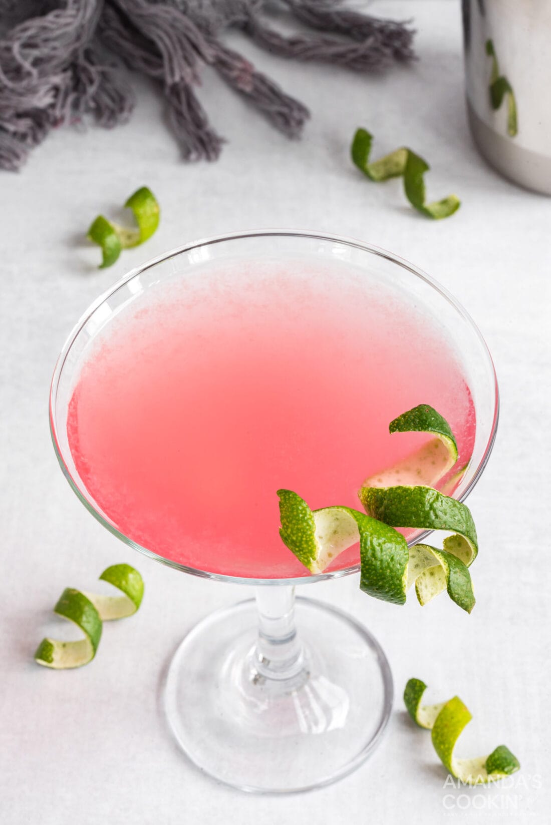 cosmopolitan cocktail with lime garnish