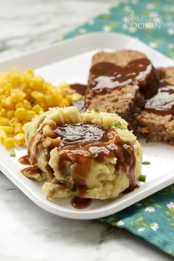 mashed potatoes and gravy on plate
