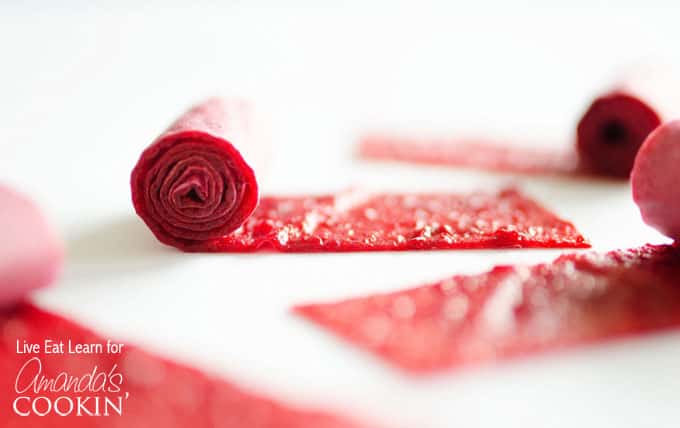 A close up of homemade fruit roll ups bring rolled.