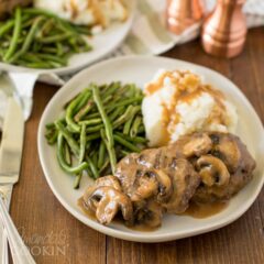 dinner plate with salisbury steaks and gravy