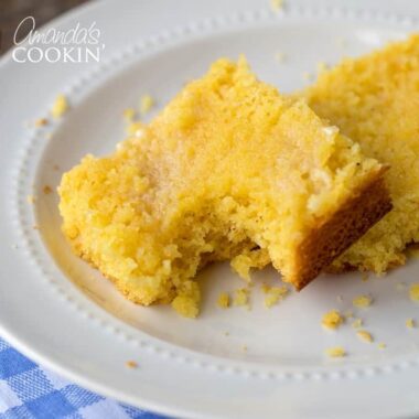 A piece of cornbread with bite out of it